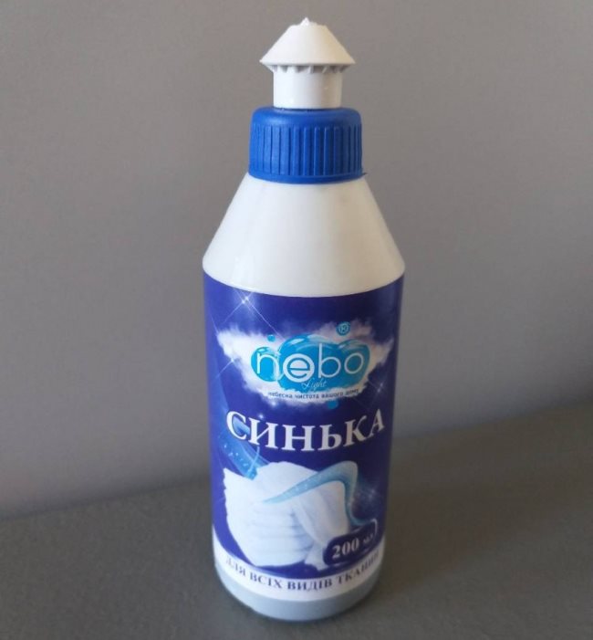 Plastic bottle with blue for dyeing tulle