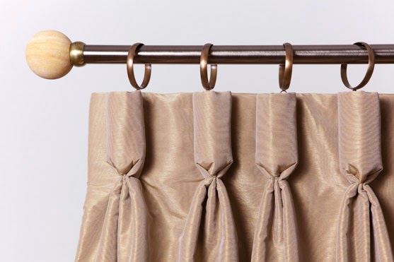 Side pleats at the top of the curtains