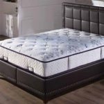 Quilted mattress with buttons on the double bed