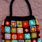 Handbag from small crocheted knitted squares