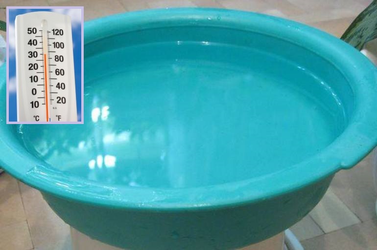 Plastic basin with water for bleaching organza tulle