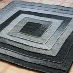 Dark blanket rug in the technique of 10 loops
