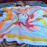 Knitted soft blanket with knitting strips