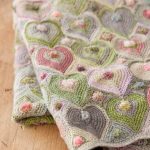 Knitted blanket of hearts - warm and beautiful