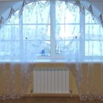 Arched window with tulle without cornice