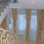 Interesting curtains for window decoration on the staircase