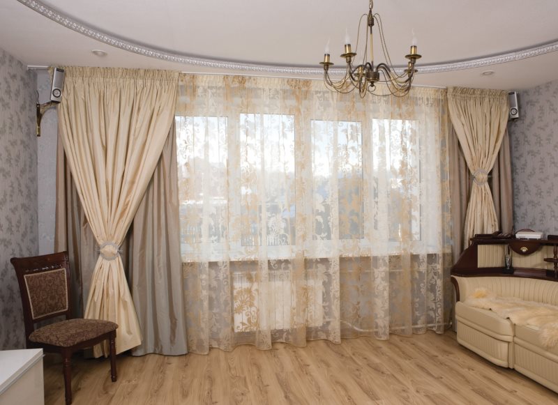 Triple curtains on the window in the hall