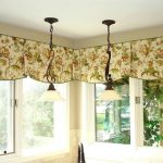 short curtains on the ceiling cornice