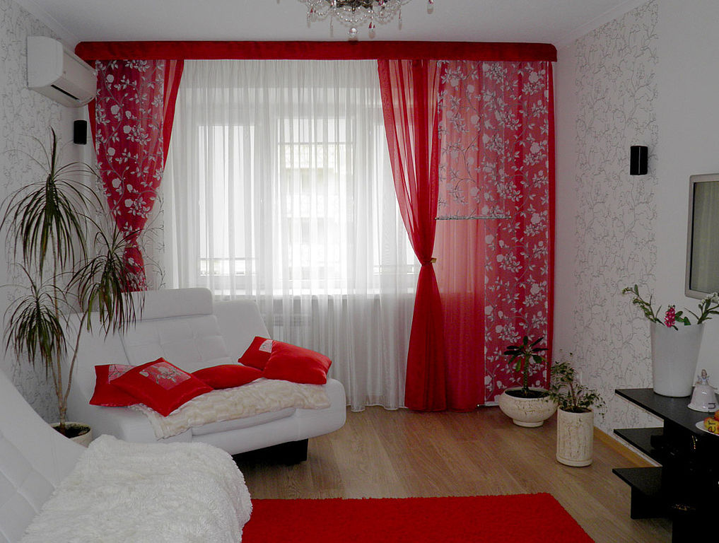 Red curtains and white tulle
