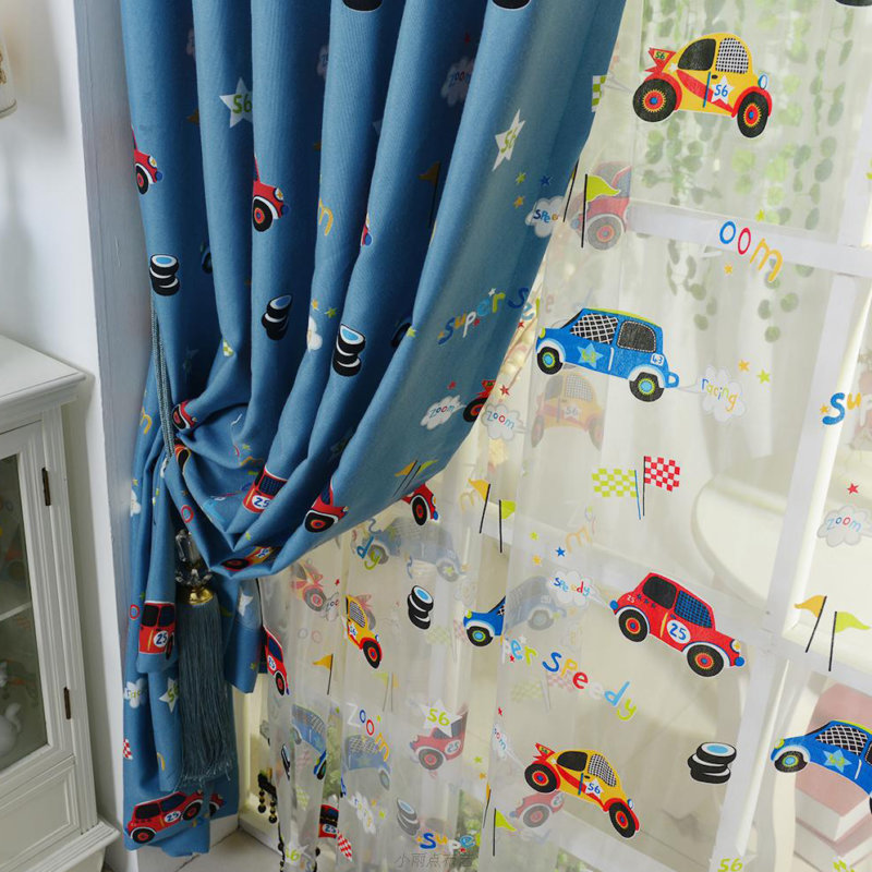 Toy cars on tulle in the boy's room