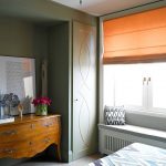 Orange curtain in the window opening