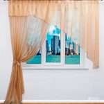 Rolled curtain with a 3D pattern and light sand-colored air curtains