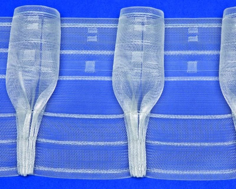 Assembling cups on a transparent curtain tape