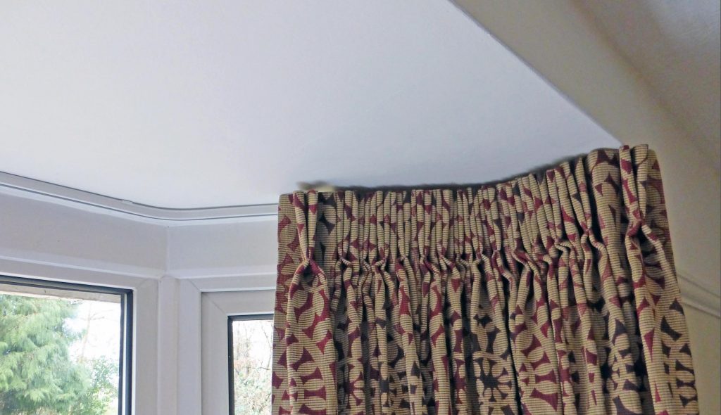 curtains on the ceiling cornice