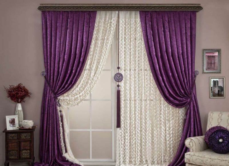 Dark purple curtains on the door in the hall