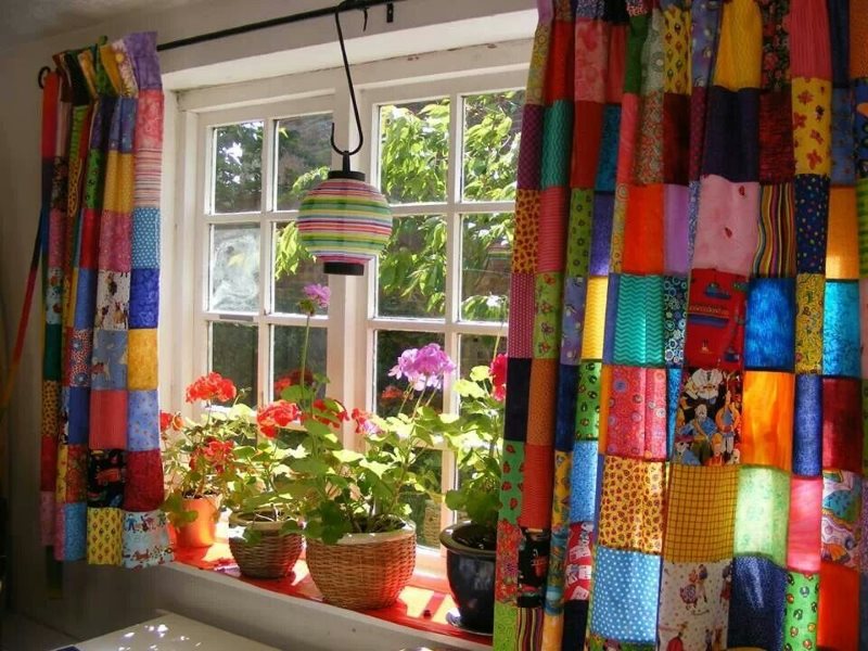 Bright curtain for the kitchen in the style of patchwork