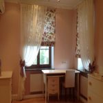 tulle in the nursery with roman blinds