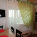 curtains in the bedroom with a balcony photo registration
