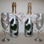 decoration of champagne bottles for a wedding design photo