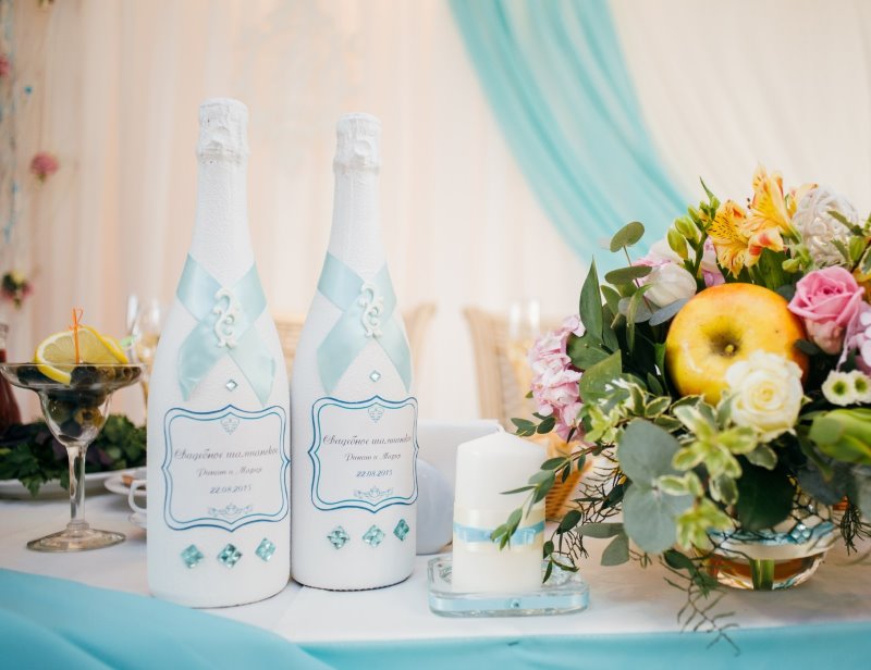 decoration of champagne bottles for wedding decor photo