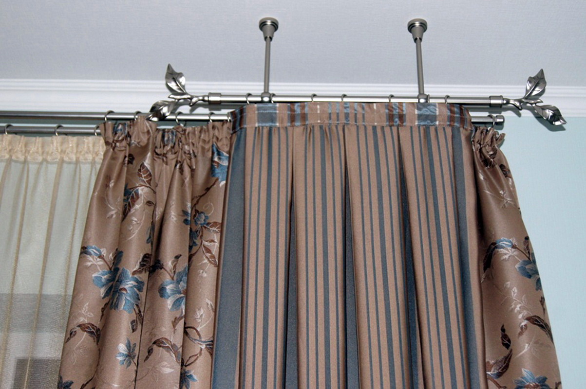 fastening curtains to the rail