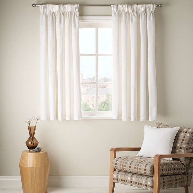 short curtains to the window sill