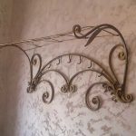 forged hangers in the hallway photo decoration