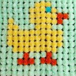 pompon blanket with duckling