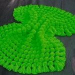 bright green pompon blanket