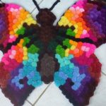 pomponowy dywanik motyla